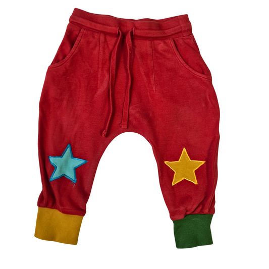 Joggers with star patches on the knees.