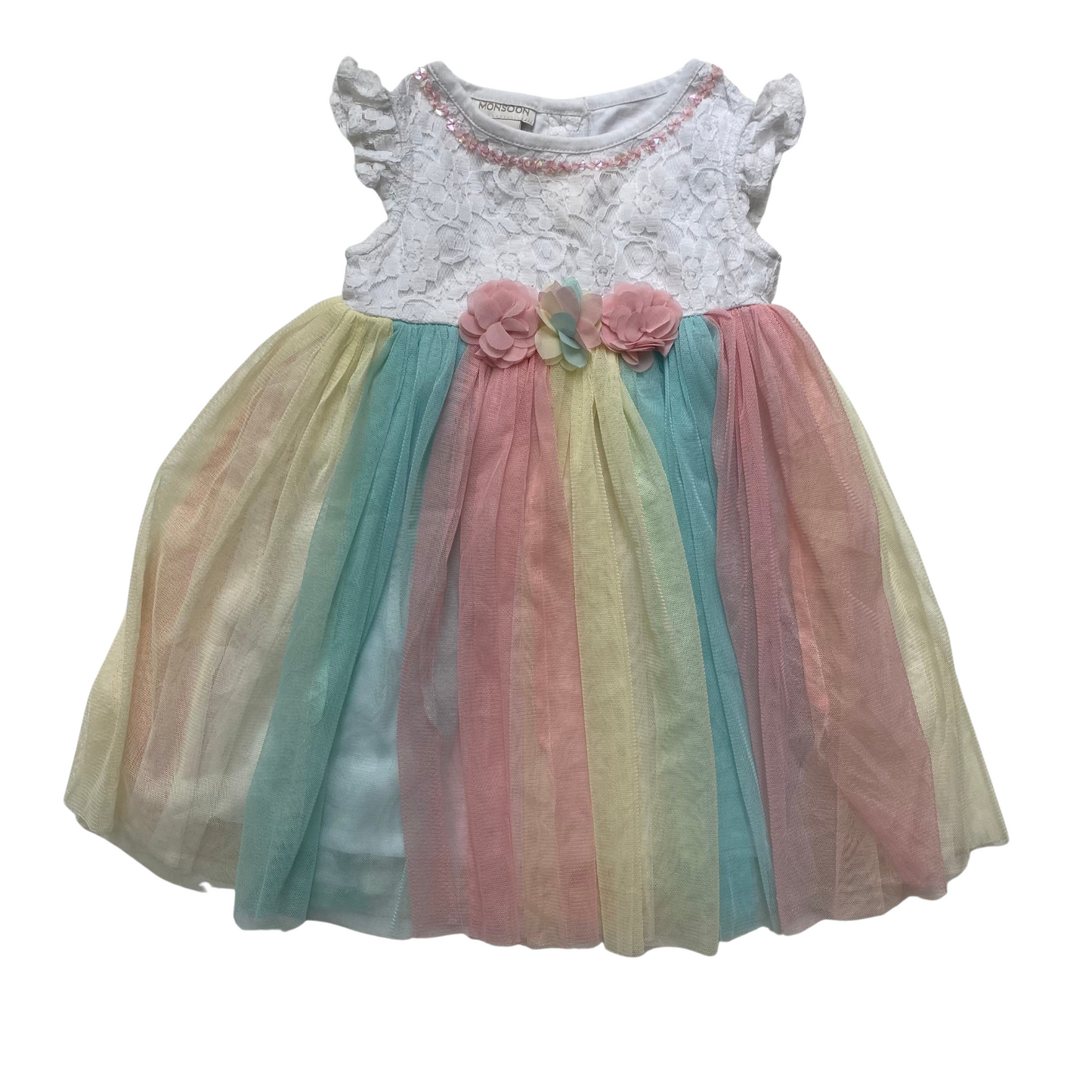 Lace dress with pastel rainbow tutu skirt.