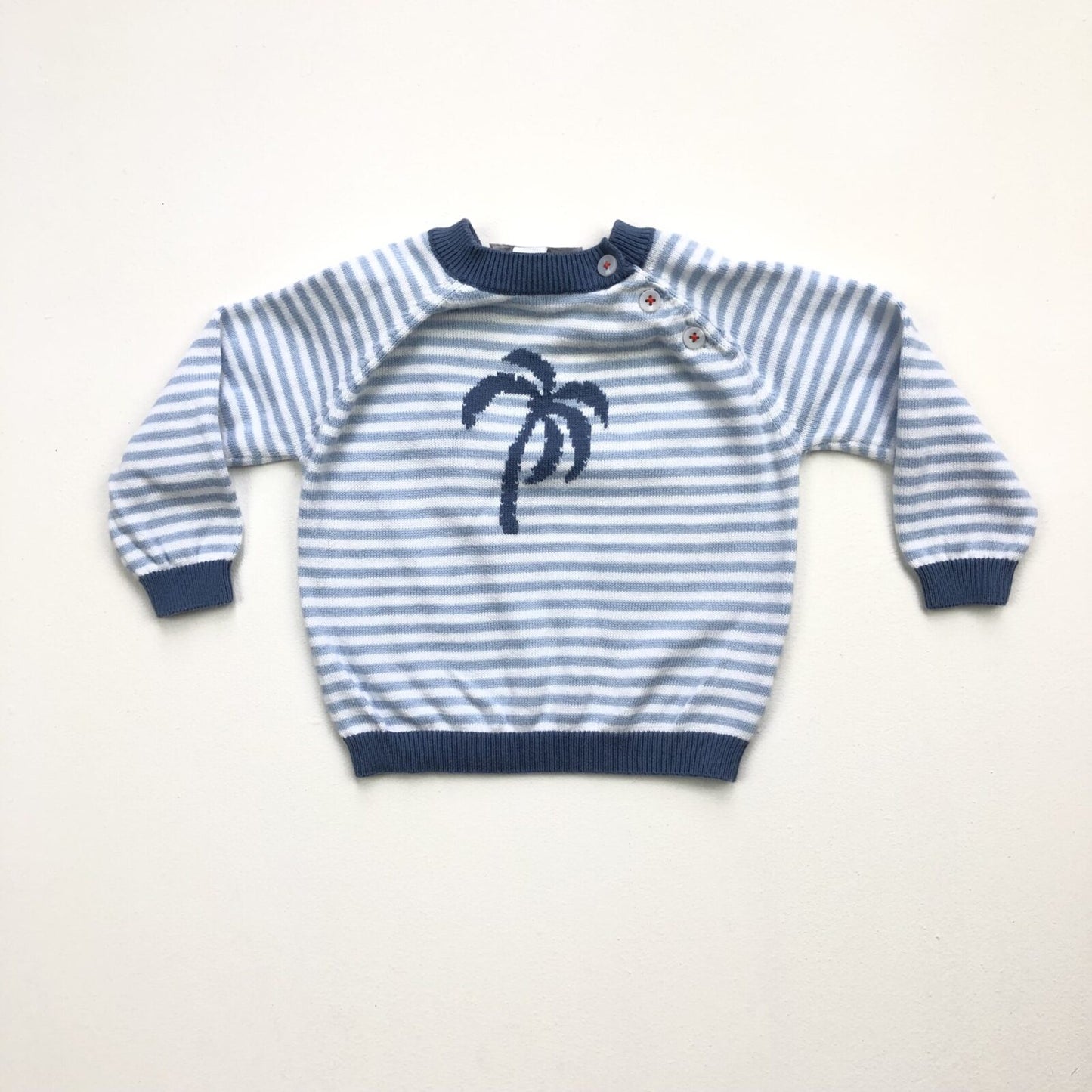 Fine knit striped cotton jumper with buttoned shoulder and palm tree design